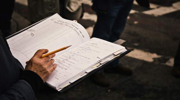 Editorial illustration for How a Script Supervisor Keeps a Film Editable: Duties From Pre-Production to the Final Cut